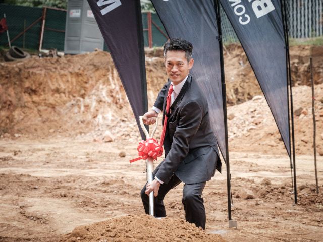 Fujifilm South Africa Managing Director Taro Kawano turning the first sod of the new head office development.